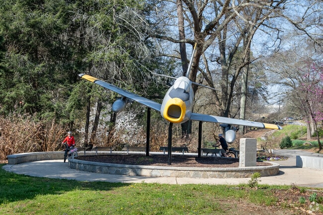 Residents in Nicholtown admire the plane model at Cleveland Park.