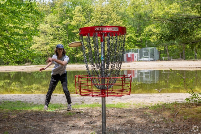 Shoot for the basket at the disc golf course at Harstuff Park in Rockland.