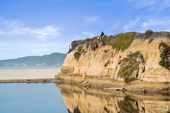 Get an amazing view from the bottom or the top of the hill at Half Moon Bay State Beach.