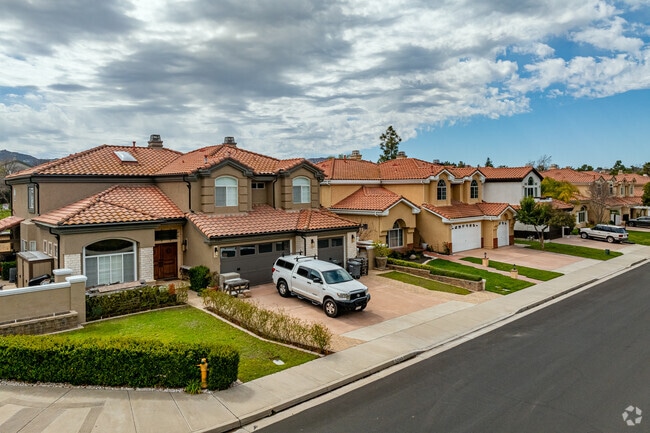 This row of homes in Vail Ranch shows how homeowners can make their property unique.