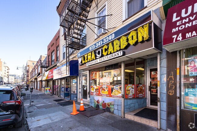 Leña y Carbón, a popular Market Street restaurant, offers traditional Peruvian cuisine and cocktails in a casual setting with a bar, dance floor, and live music.