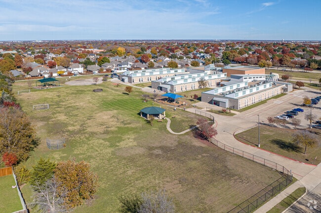 Arthur High Mcneil Elementary School has a large amount of play area for children to enjoy.