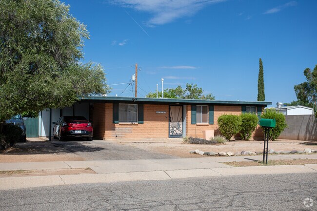 Stella Mann homes often feature a metal screen door for privacy and fresh air.
