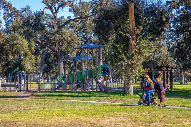 Kids flock to the playground at Oak Park after school.