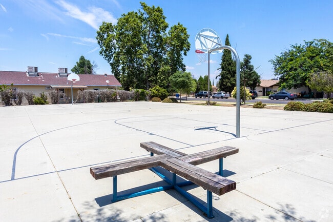 Play basketball at Community Day School in Sanger.