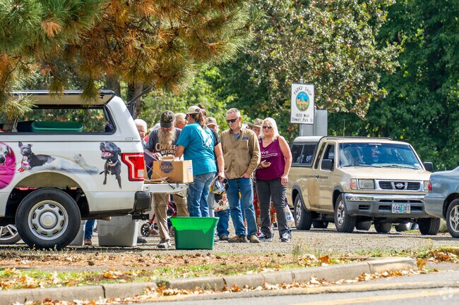 Farmers sell fresh produce to neighbors in Roseburg.