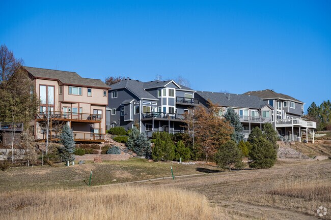 Large homes in The Outlook offer views of the Rocky Mountains and border open space.