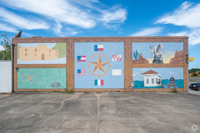 Colorful murals decorate historic buildings in downtown La Marque.