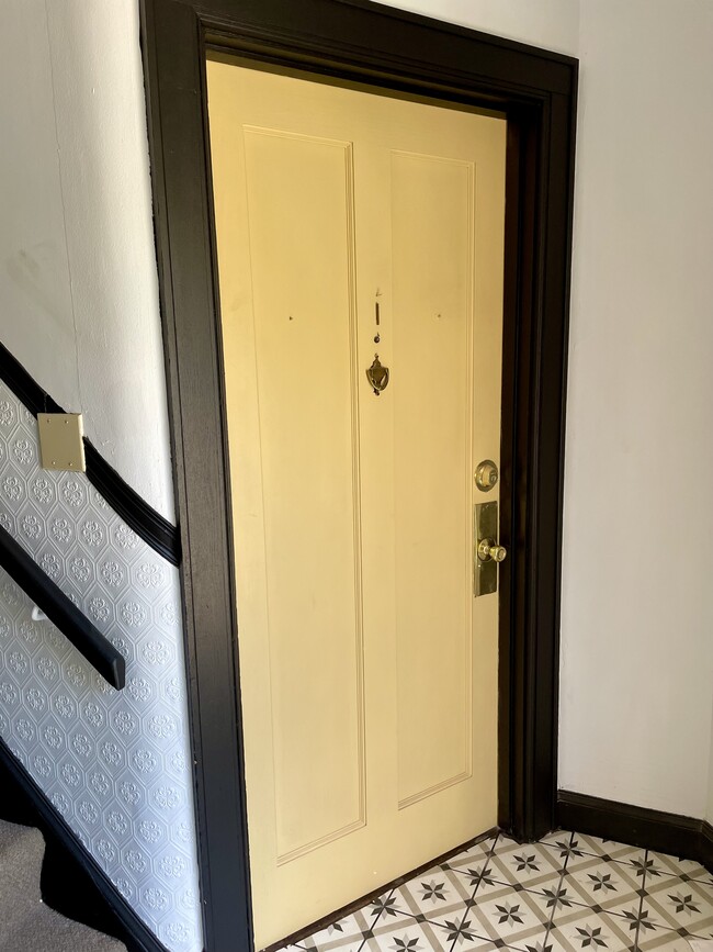 Private entrance in front (pictured) and in rear of building
