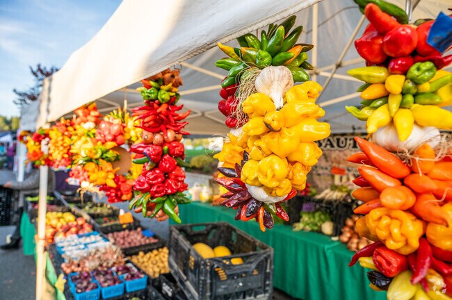 On Thursdays, Five Corners locals visit the Burien Farmers Market for produce and goods.