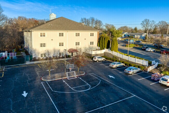 Students love using the basketball court at New Road School.