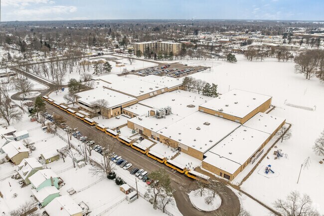 Buses line up at the end of the school day at Gardner International Magnet School.