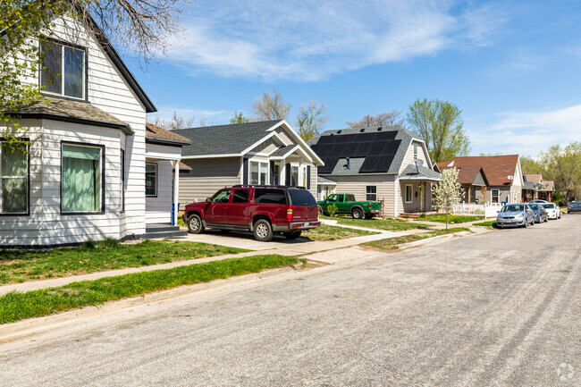A row of homes in TO Smith neighborhood has a cozy and welcoming feel.