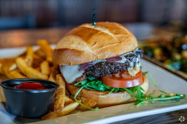 Enjoy a classic burger and some fries at Topside Bar & Grill in Steilacoom.