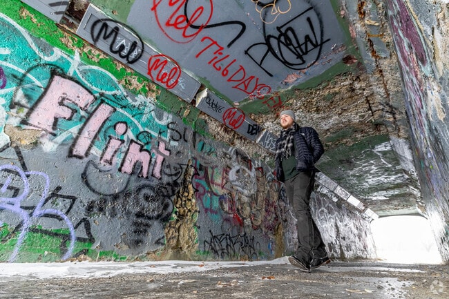 An urban tunnel connects College Cultural Neighborhood to nearby Kearsley Park.