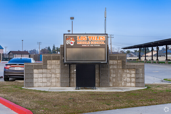 A lighted marquee greets students at the entrance to Los Tules Middle School in Tulare.