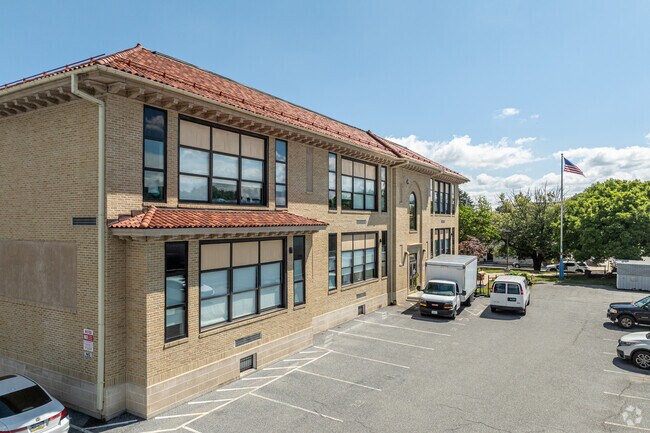 Natural, adobe roof tiles help keep Ross Elementary School cool in warmer months.