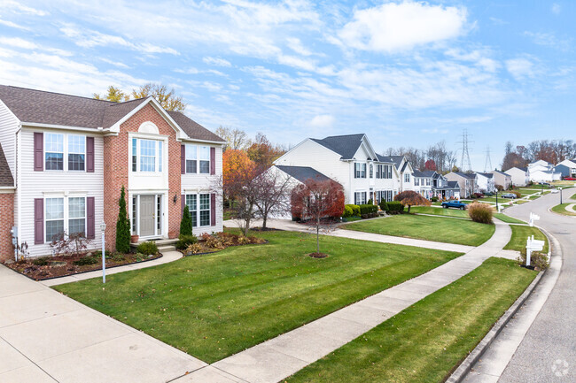 Beautiful two-story homes with shutters are found throughout the Washington Square neighborhood.