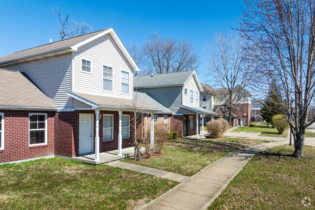 Homes in Wabash Crossing run along well maintained sidewalks with mature trees.