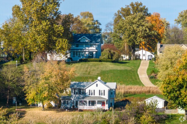 A row of prairie-style homes with a river view in Stensvad District, Bettendorf.
