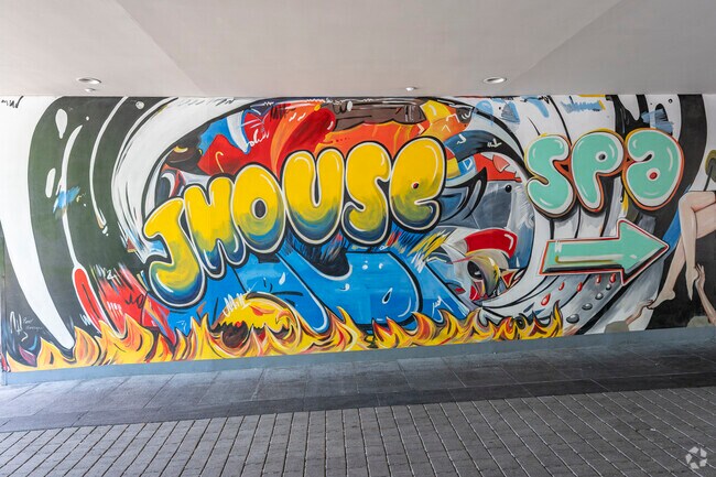 The bright art installation welcomes you to Tony's and the JHouse in Riverside.