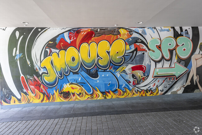 The bright art installation welcomes you to Tony's and the JHouse in Riverside.