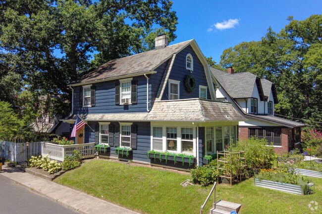 Cadwalader & Hillcrest neighborhood has many different home styles like this Dutch Colonial.