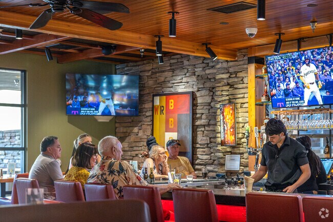 Hang out and watch the game with friends at Wood Ranch in Dos Lagos.