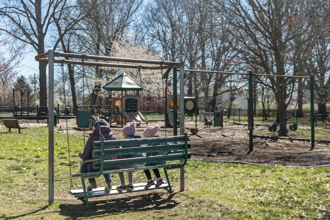Explore nature trails, playgrounds, and a historic flagpole at Olivette's Stacy Park.