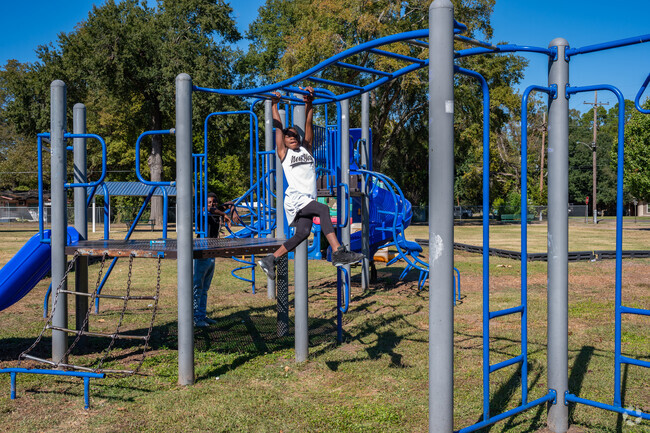 Kids always enjoy the cross bars at Lida Benton Playground.