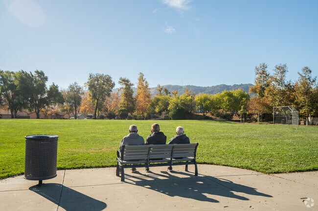 Val Vista Park is a place where people come to enjoy the warm sun on a fall day.