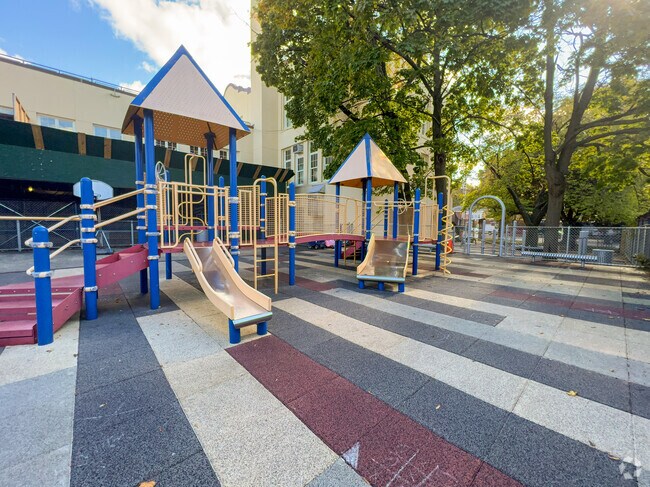 Children love recess on the vibrant playground at P.S. 94 - David D. Porter.