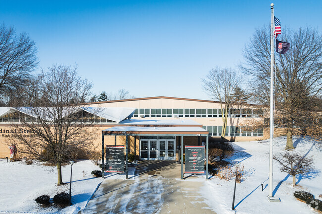 Cardinal Stritch High School front doors welcome all.