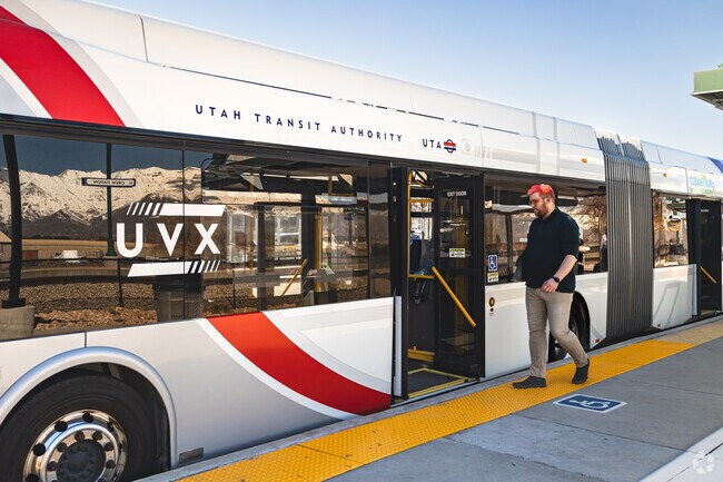Riders board UVX buses at Orem Station in Westmore.