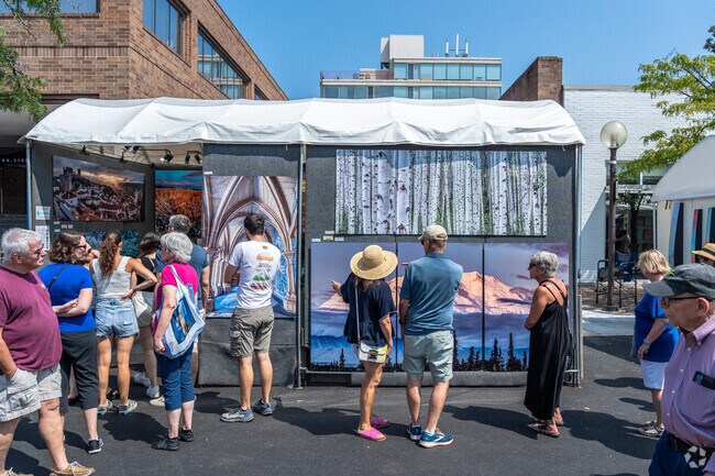 Patrons admire beautiful works of art at East Highland Park's Port Clinton Art Festival.