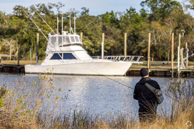 A local man fishes along the banks at Henderson Point Park in Pass Christian.