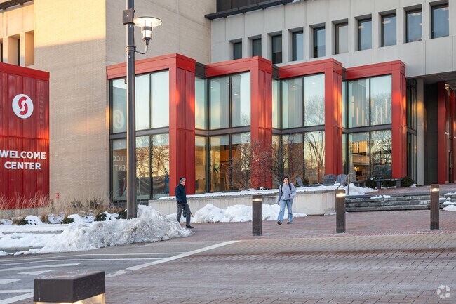 Students walk to class on a brisk winter day at Sinclair Community College in Downtown Dayton.