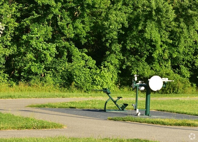 Outdoor workout equipment along a scenic trail in Coral Hills encourages residents to stay active.