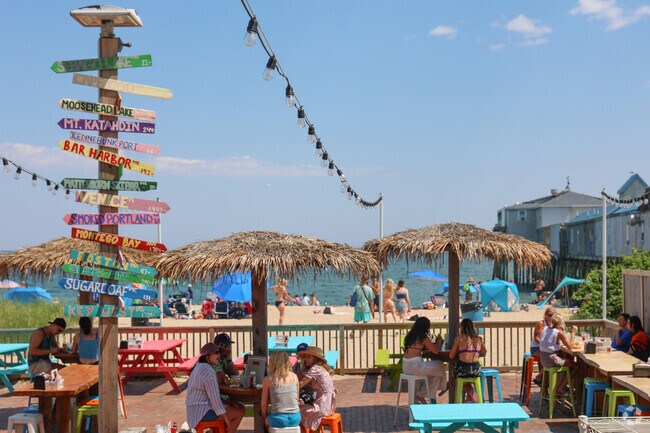 A nearby tiki bar offers ocean views near Kinney Shores.