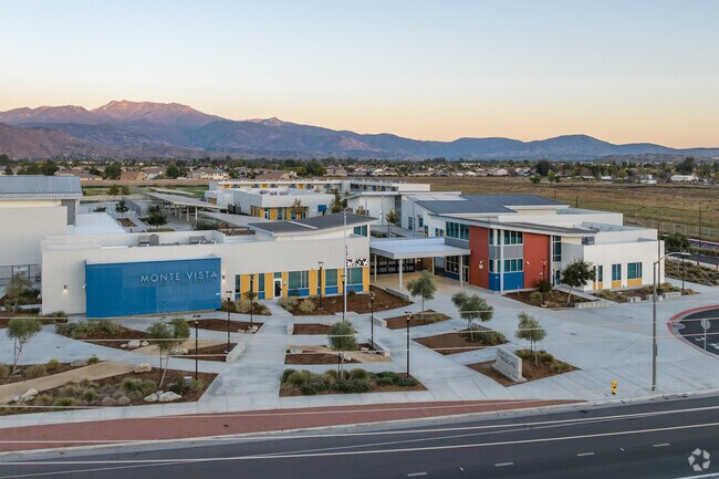 The colorful campus of Monte Vista Middle School shines at sunset near River.