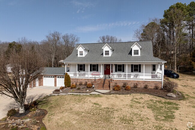 Farmhouse style homes can be found dotting the landscape around Athens, TN.