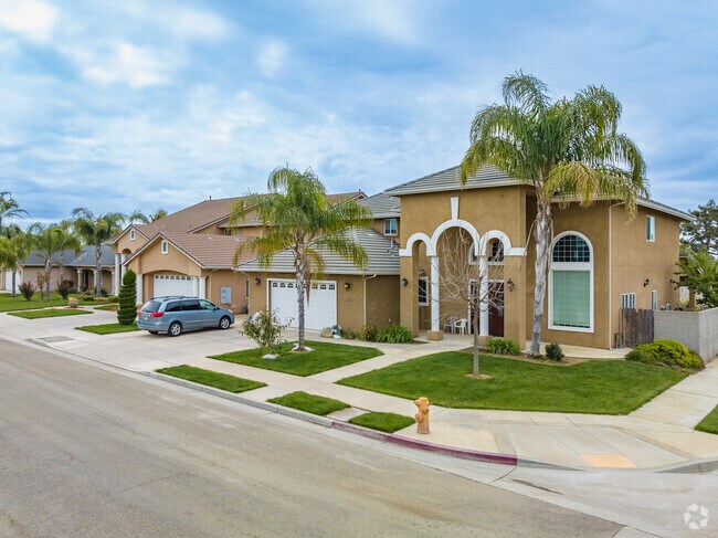 Homes with classic columned entryway give variety to the Woodlake neighborhood.