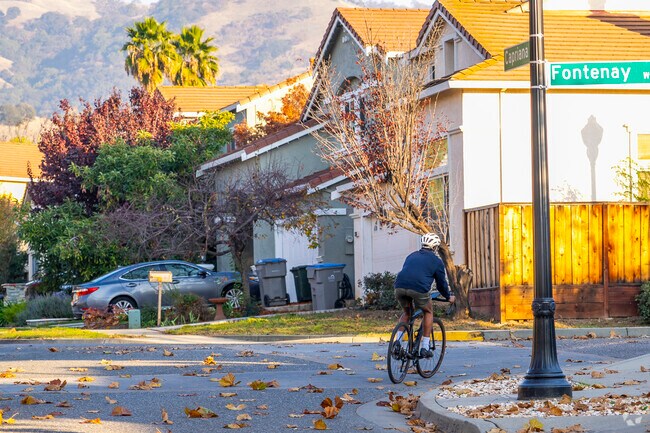 Enjoy serene living surrounded by vineyards in this exclusive neighborhood.