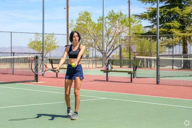 There are several tennis and pickleball courts at Lime Street Park near Angeles Acres.