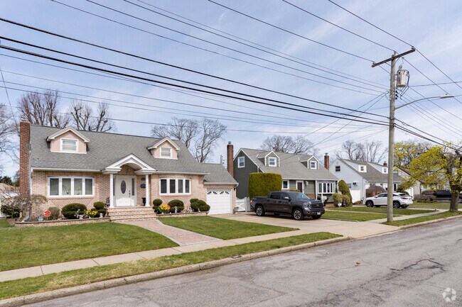 Cape Cod style homes are very popular in East Meadow.