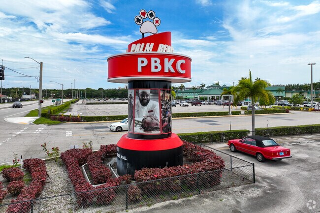 Large signage of the Palm Beach Kennel Club in Golfview Heights neighborhood.