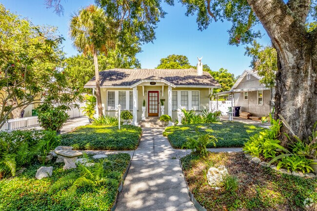 Comfy bungalows with front porches make a pleasant home to sit back & enjoy SoHo neighborhood.