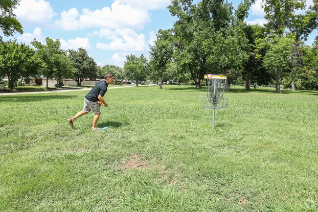 Practice your putt and drive on Dovillio Disc Golf Course in Layman-Van Acres.