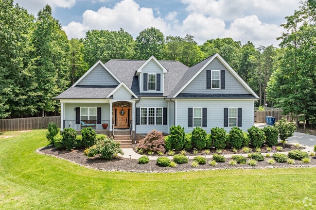 Landscaping adds charm as a traditional home greets visitors in Browns Summit.