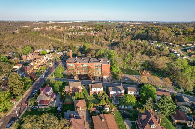 Get a nice view of all of Moore Elementary School and its beautiful landscape in Pennsylvania.